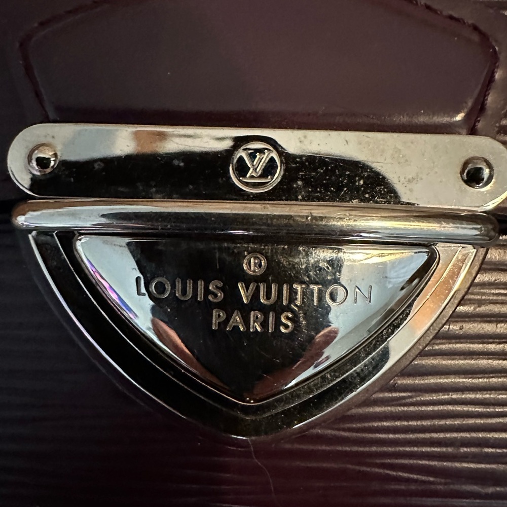The Louis Vuitton Portefeuille Koala Wallet in Epile Purple Leather